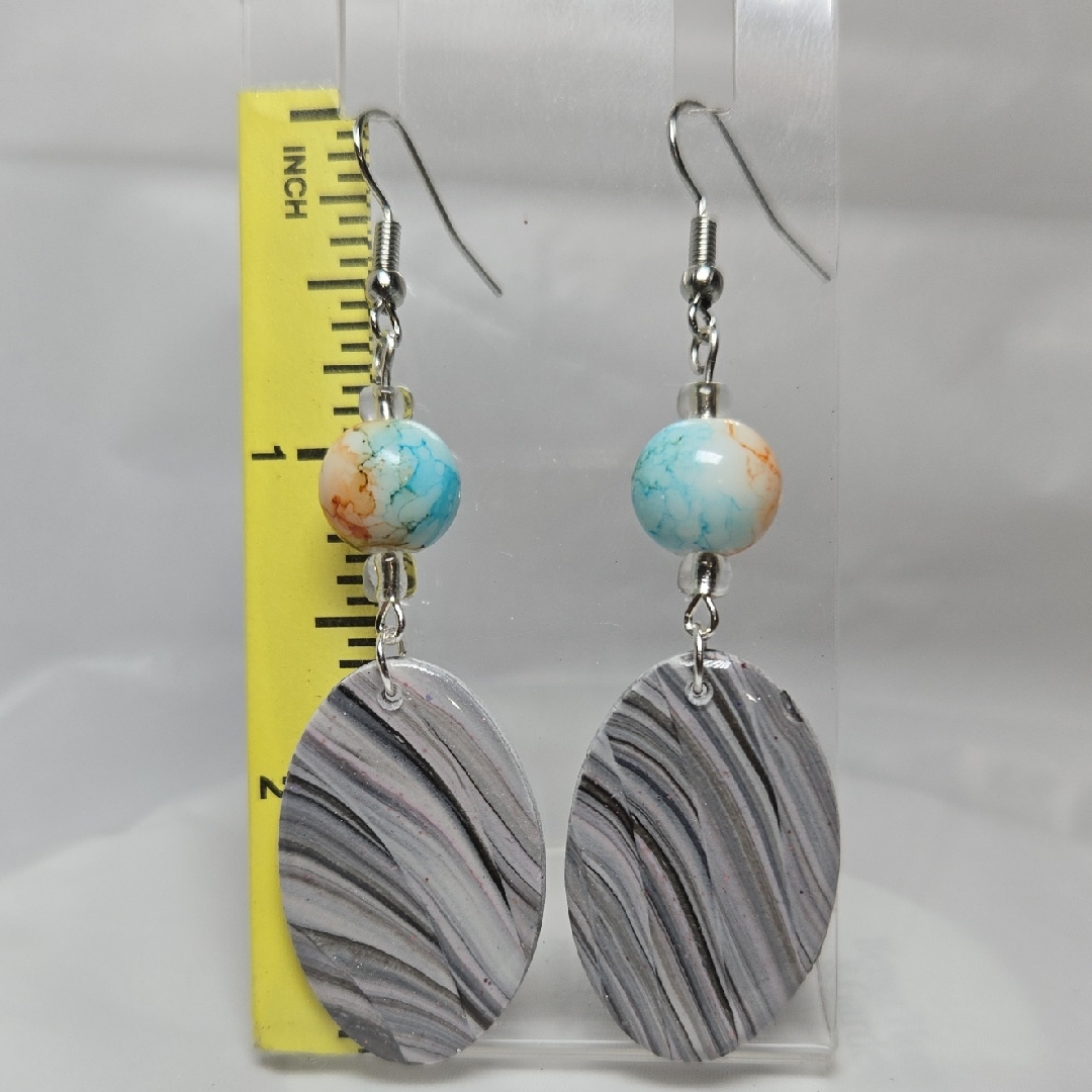 B295- Elegant Silver And Turquoise Swirl Earrings 20$